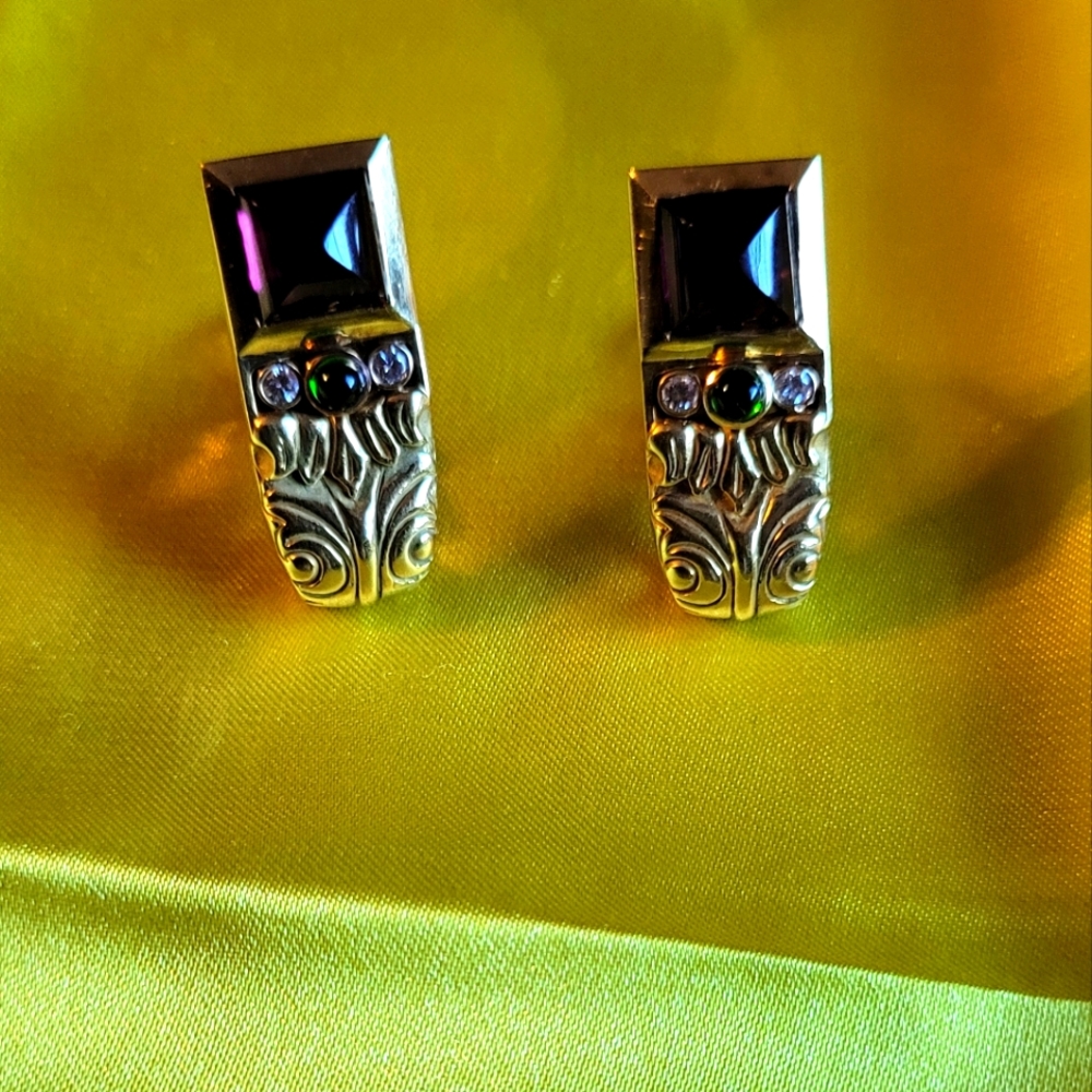 18k gold earrings by designer Paul Robilotti